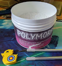 polymorph tub with duck eraser and scalpel