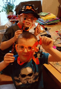 Alex and Joseph showing off there newly completed Drawdio and OSHW RGB badges while sporting ragworm safety glasses