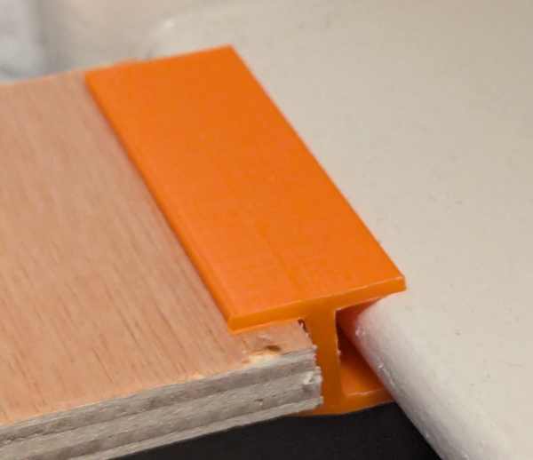 Photo of a custom 3D printed shelf connector