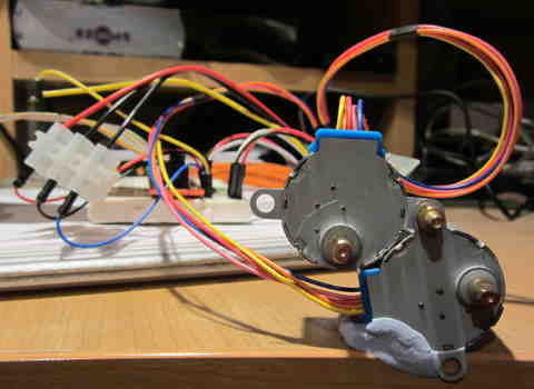 Two stepper motors attached with motherboard risers